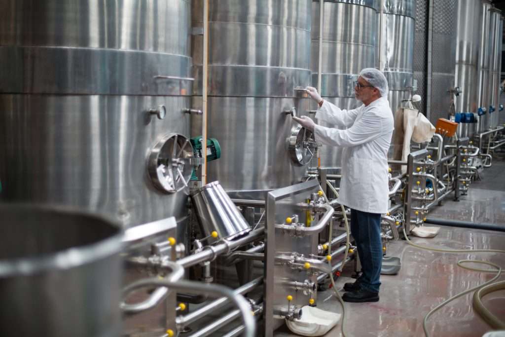What is batch fermentation? Workers doing batch fermentation
